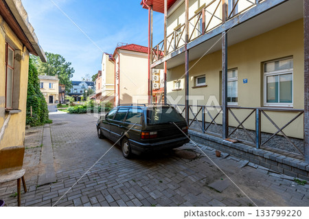 Quiet Residential Yard with Parked Old Car Quiet Residential Yard with Parked Old Car 133799220