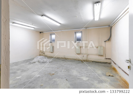 Empty Basement Room with Concrete Floor Interior Empty Basement Room with Concrete Floor Interior 133799222