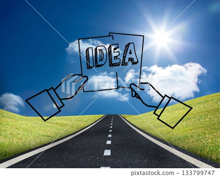 Graphic with two hands holding an idea on bright countryside Graphic with two hands holding an idea on bright countryside 133799747
