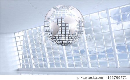 Grey globe floating in room 133799771