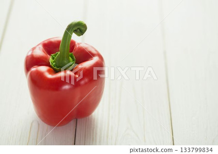 Fresh red pepper on wooden table Fresh red pepper on wooden table 133799834