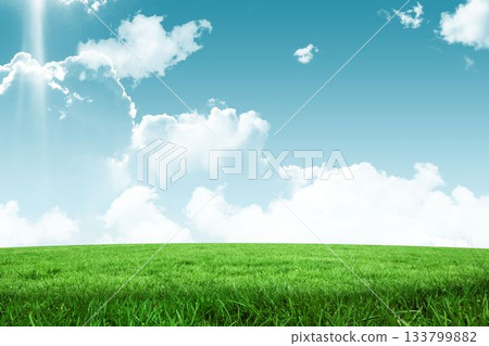 Grassy meadow is stretching across flat design scene, showing cumulus clouds and sunlight beam Grassy meadow is stretching across flat design scene, showing cumulus clouds and sunlight beam 133799882