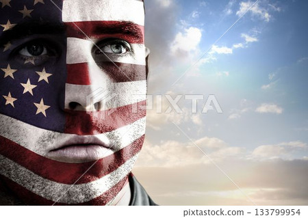 Painted male face is being shown in flat design with stars and stripes under cloudy sky 133799954