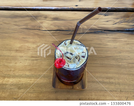 Iced coffee with cherry 133800476