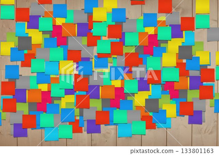 Various sticky notes hanging on wall 133801163