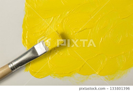 Yellow paint with paintbrush Yellow paint with paintbrush 133801396