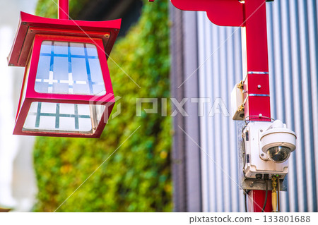 Tokyo cityscape in Japan: Asakusa bustling with foreign tourists. Security cameras at Kaminarimon Ichinomiya Shopping Street near Sensoji Temple. 133801688