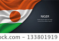 Niger national flag with smooth fabric texture background 133801919