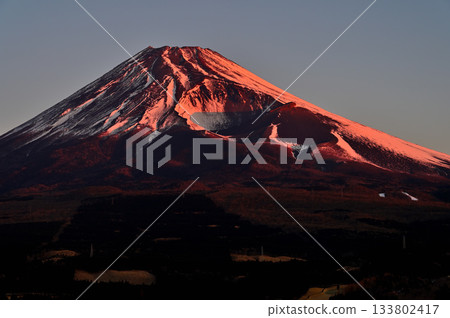 Mount Fuji and the Hoei crater bathed in the morning sun from the Torigoki Plateau Observatory on Mount Echizen in the Aitaka Mountains 133802417