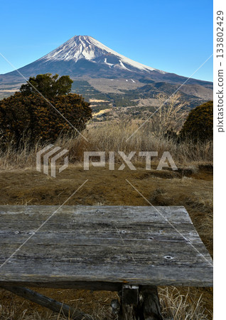 Mount Echizen in the Aitaka Mountains. View of Mount Fuji from the bench-lined Umanose Observatory. 133802429