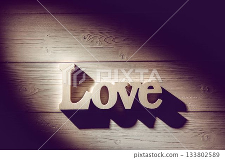 Love text on wooden table Love text on wooden table 133802589