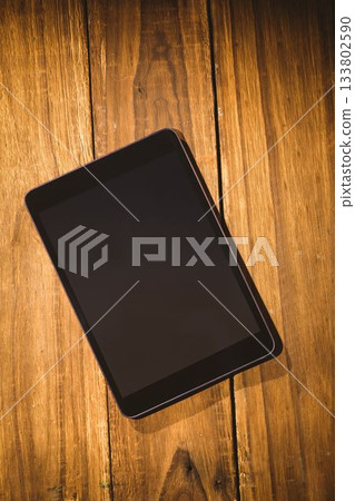 Overhead of tablet on desk Overhead of tablet on desk 133802590