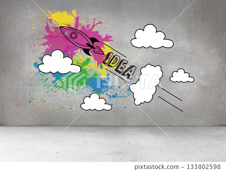Rocket labeled IDEA is blasting off through colorful splatters and clouds in graffiti-style mural Rocket labeled IDEA is blasting off through colorful splatters and clouds in graffiti-style mural 133802598