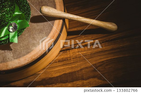 Badhran and stick with green hat Badhran and stick with green hat 133802766
