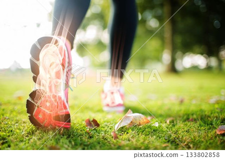Jogger experiencing ankle pain Jogger experiencing ankle pain 133802858