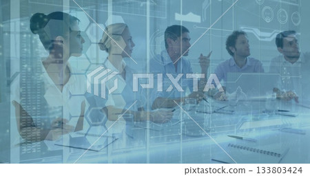Pointing male guiding business team in office, reviewing holographic schematics on glass table Pointing male guiding business team in office, reviewing holographic schematics on glass table 133803424