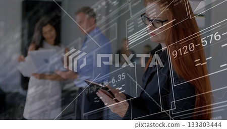 Studying woman in black blazer analyzing tablet data in conference room, data overlays, copy space 133803444