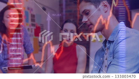 Analyzing man in denim shirt studying data in office, with chart overlays, copy space 133803470