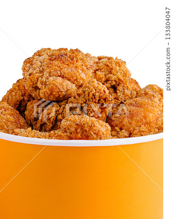 Crispy fried chicken in a container ready to be served at a gathering Crispy fried chicken in a container ready to be served at a gathering 133804047