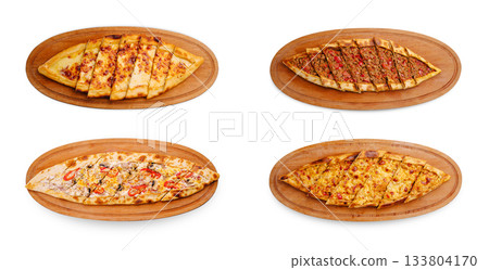 Delicious variety of traditional flatbreads served on wooden platters Delicious variety of traditional flatbreads served on wooden platters 133804170
