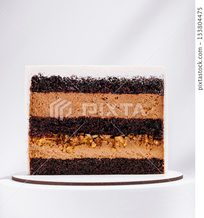 Delicious chocolate layer cake with rich fillings and smooth frosting Delicious chocolate layer cake with rich fillings and smooth frosting 133804475