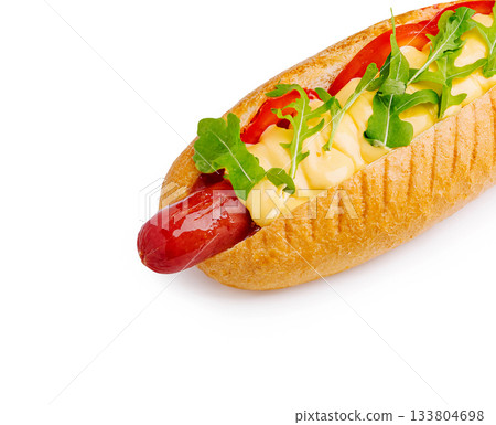 Delicious hot dog with fresh toppings served in a soft bun 133804698