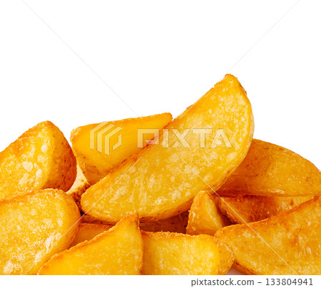 Crispy golden potato wedges served fresh for a tasty snack or side dish Crispy golden potato wedges served fresh for a tasty snack or side dish 133804941