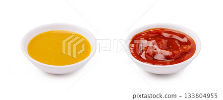 Mustard and ketchup served in small bowls for a meal or snack 133804955