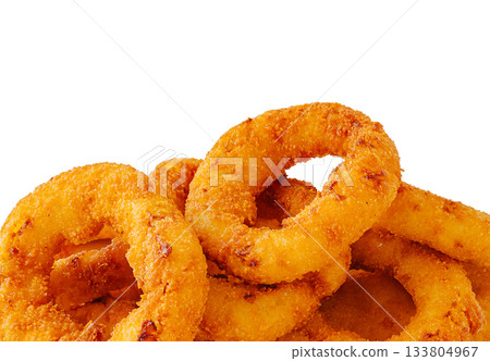 Crispy fried onion rings served as a tasty snack or appetizer option Crispy fried onion rings served as a tasty snack or appetizer option 133804967