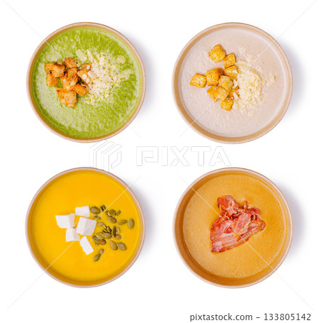 Colorful bowls of delicious soups served in a contemporary style Colorful bowls of delicious soups served in a contemporary style 133805142