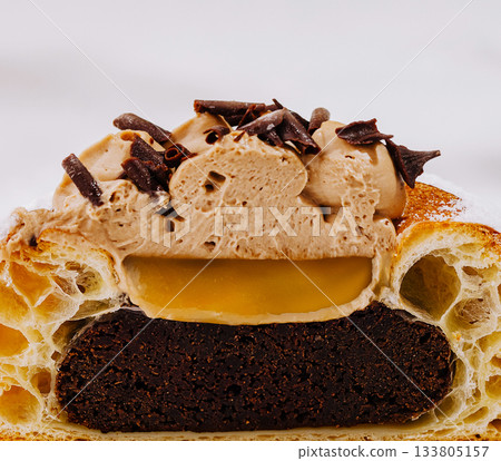 Delicious dessert with layers of chocolate and cream at a pastry shop 133805157