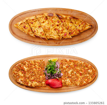Delicious flatbreads served on wooden platters at a cozy restaurant Delicious flatbreads served on wooden platters at a cozy restaurant 133805261