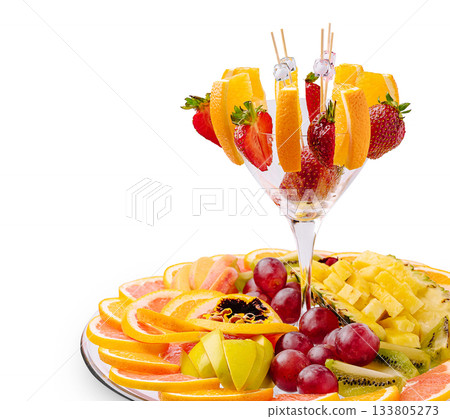 Colorful fruit platter with tropical flavors and refreshing presentation Colorful fruit platter with tropical flavors and refreshing presentation 133805273