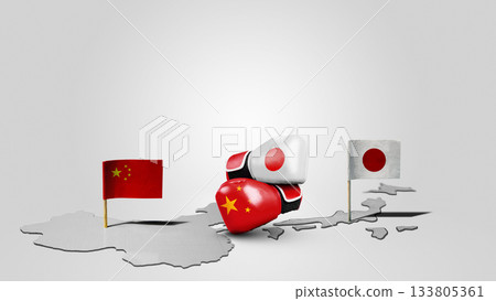 Two boxing gloves with China and Japan national flags facing each other. Conflict between China against Japan 133805361