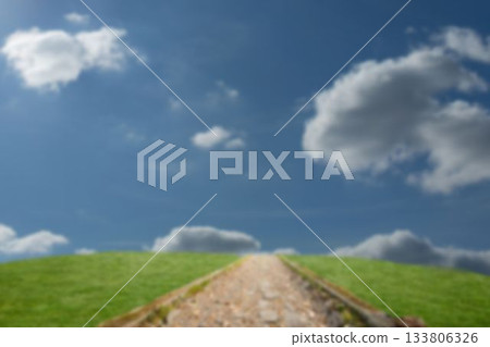 Footpath on field against sky Footpath on field against sky 133806326