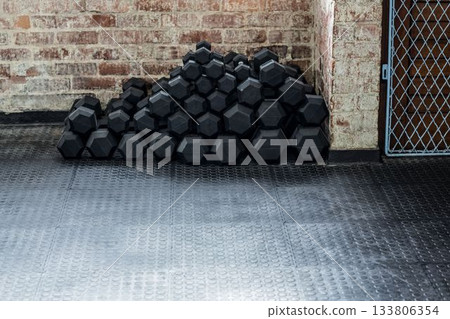 Dumbbells on floor in gym Dumbbells on floor in gym 133806354