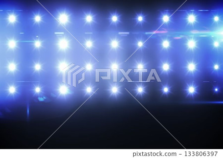 Illuminated blue floodlight 133806397