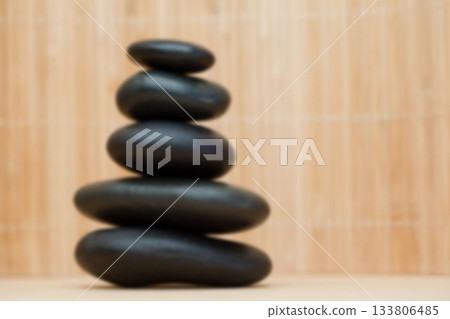 Stones against wooden wall Stones against wooden wall 133806485