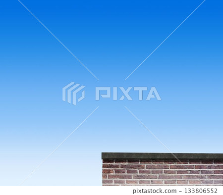 Low angle view of brick wall against sky 133806552