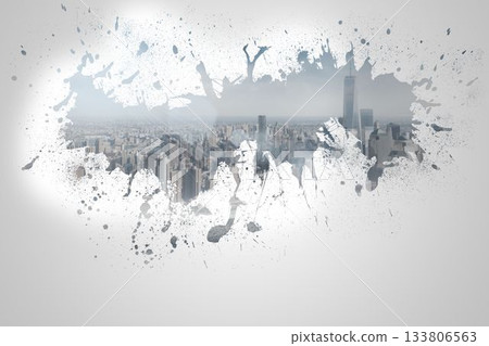 Splash on wall revealing cityscape 133806563