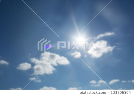 Low angle view of sunbeams with lens flare Low angle view of sunbeams with lens flare 133806564