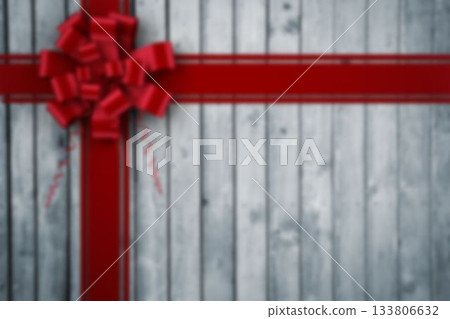 Flat design is featuring bright red satin ribbons forming cross with bow on grey plank background Flat design is featuring bright red satin ribbons forming cross with bow on grey plank background 133806632