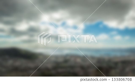 Flat design is showing blurred hilltop overlook featuring coastal cityscape under cloudy sky Flat design is showing blurred hilltop overlook featuring coastal cityscape under cloudy sky 133806708