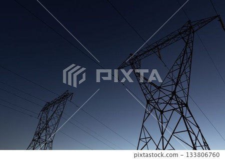 The evening electricity pylon silhouette The evening electricity pylon silhouette 133806760