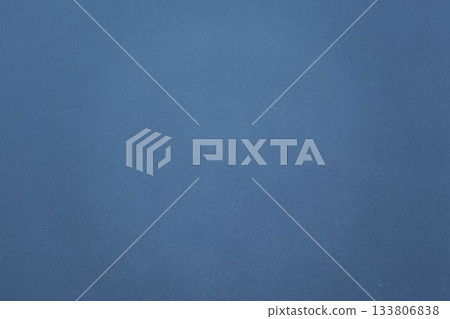 Uniform blue textured surface is filling full frame in flat design and creating abstract backdrop 133806838
