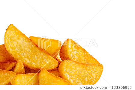 Crispy golden potato wedges piled up in a delicious heap Crispy golden potato wedges piled up in a delicious heap 133806993