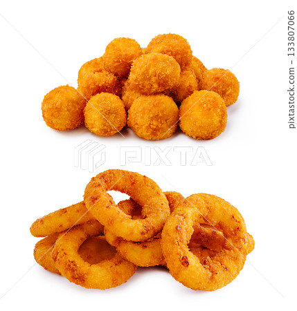 Delicious golden snacks including round and ring shaped options for sharing 133807066