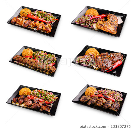 Delicious grilled dishes served with rice and vegetables at a vibrant eatery 133807275