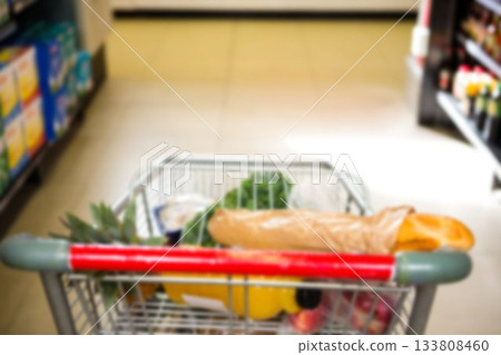 Food and bottle in shopping cart Food and bottle in shopping cart 133808460