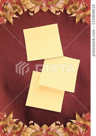 Autumn leaves with yellow note 133808618